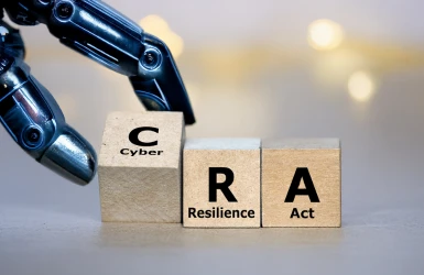 Würfel bilden den Ausdruck Cyber Resilience Act (CRA)
